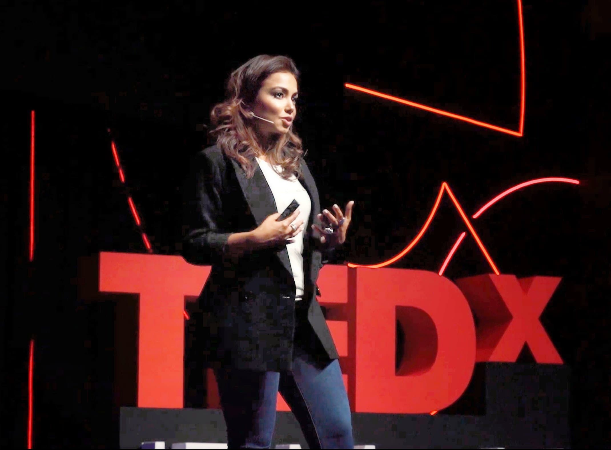 Applied neuroscience keynote speaker Sam Hernández García on the TEDx stage