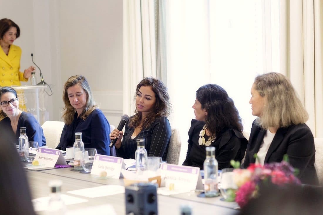Sam speaking on a panel at the Global Bridges Forum
